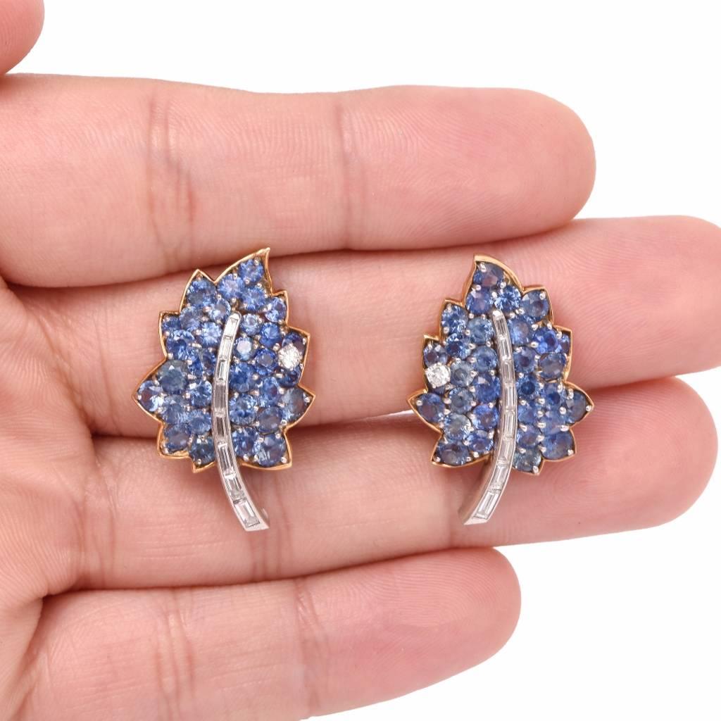 This beautifull vinatge 1950's hand crafted Diamond Sapphire earrings in stunning 18k yellow. Nature inspired leaf motif are adorned with 60 genuine round full cut Sapphires,  approximately 5.80 carats and accented with 16 genuine baguette cut