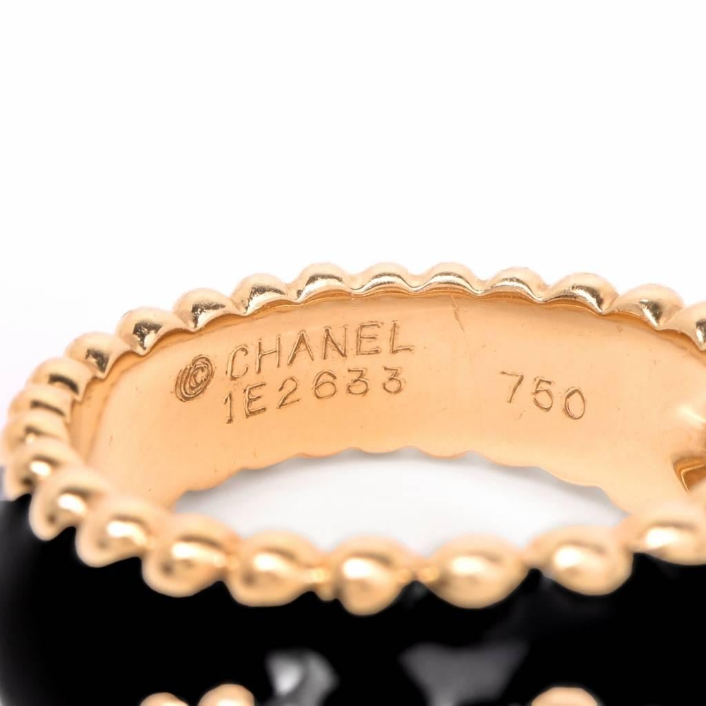 This captivating Chanel vintage diamond French enamel ring is crafted in 18k yellow gold. It is adorned with 3 genuine round full cut diamonds total carat weight approximately 0.75carats with average G-H in color, VS1 in clarity finished with French