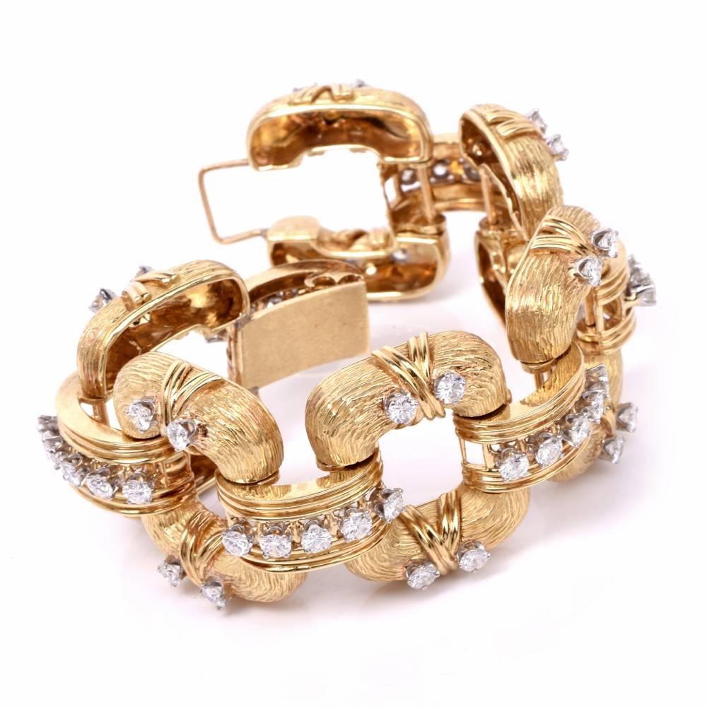 This bold bracelet from late 1970's is crafted in solid 18K matted and polished yellow gold. Designed as a buckle link motif bracelet, this captivating bracelet is composed of 6 rounded rectangular links and adjoined by well-designed polished gold