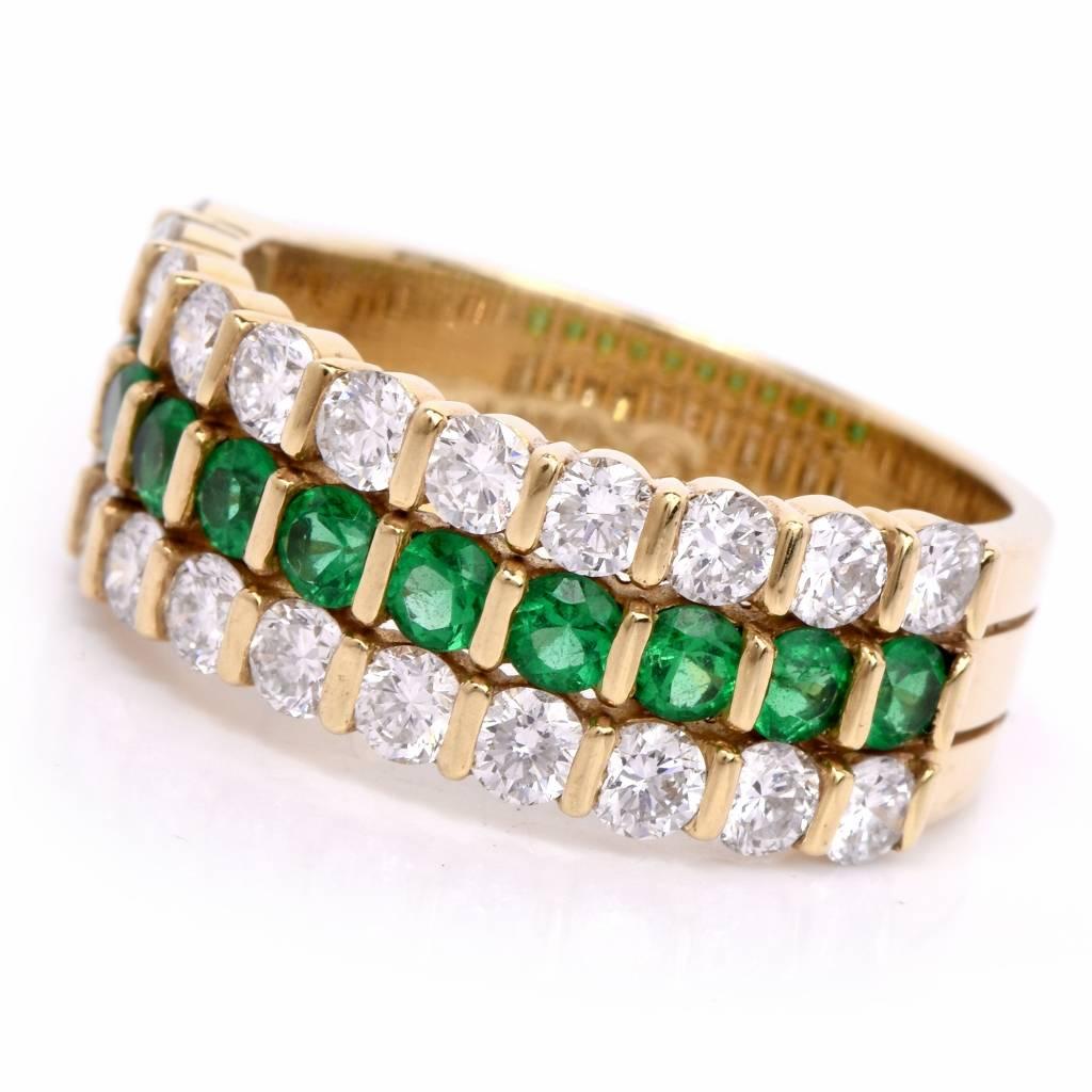 This high quality Diamond Emerald ring Band made by well-established house of Gemlok in 18K yellow gold. With its wide shank provides a warm, gleaming base and three rows of diamonds and emerald that gives the impression three-individual bands. This