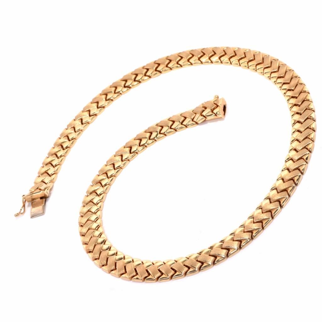 This alluring classic necklace of Italian  workmanship is crafted in a combination of 14-karat matted and polished yellow gold, weighs 39.5 grams and measures 16 inches long x 11 mm wide. This alluring necklace of unmatched drefinement comprises