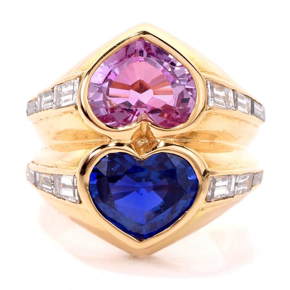This Bvlgari Diamond Sapphire ring in crafted in solid 18K yellow gold. Set with two Natural no heat heart shape pink and blue sapphires, GIA certificate number 618728739 measuring one approx. 6.34 x 8.96 x 5.53mm and the other 7.20 x 10.06 x 5.50mm