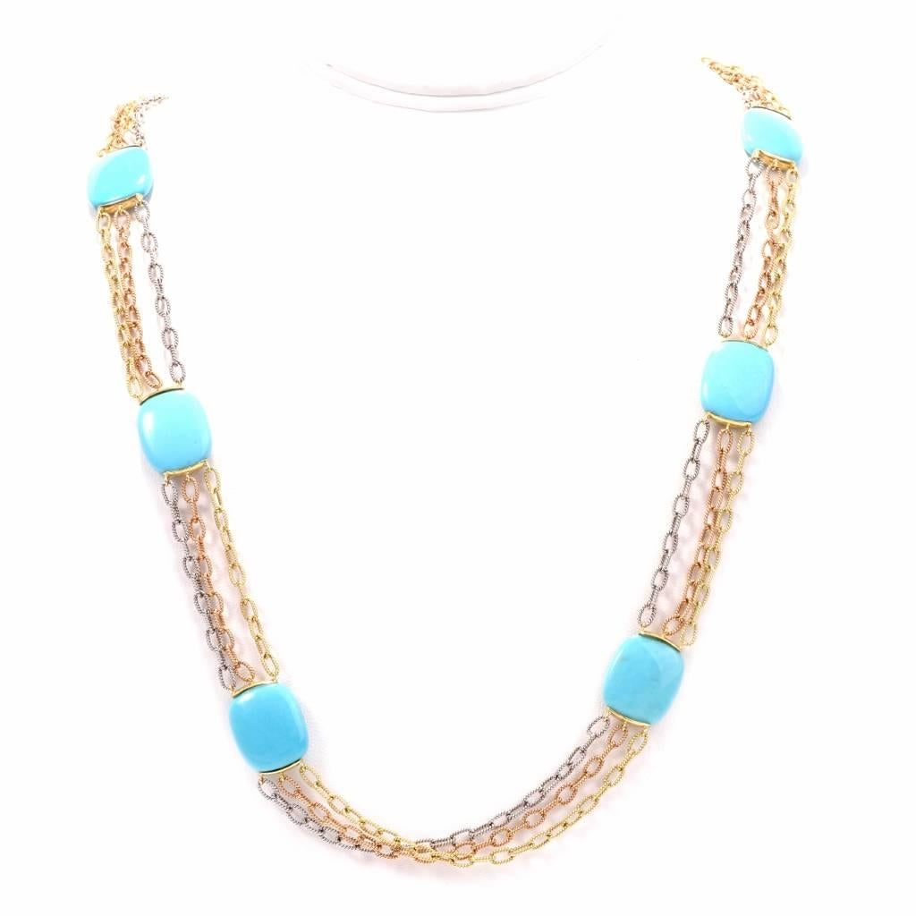 This stylish Turquoise necklace is crafted in solid 18K yellow, rose, & white gold. It features a Turquoise by the yard design adorned with 6 genuine natural Turquoise approx: 67.08 carats  interlinked by three tone gold chains in between. It