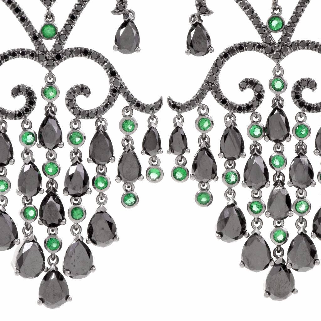 hese aesthetically mesmerizing and Georgian style chandelier earrings with black diamonds and emeralds are crafted in 18-karat black gold and are inspired by the 19th century Iberian chandelier earrings with cascading pendants which were invogue