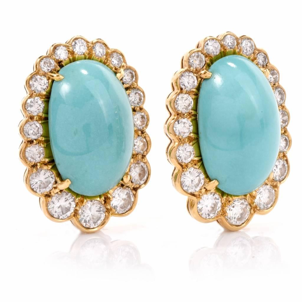 These fabulous vintage clip back earrings. Finely crafted in solid 18K yellow gold, these earrings feature 2 genuine cabochon Persian turquoise approx. 32.50 carats, and are set in a sparkling halo of 38 genuine round cut diamonds approx. 5.30