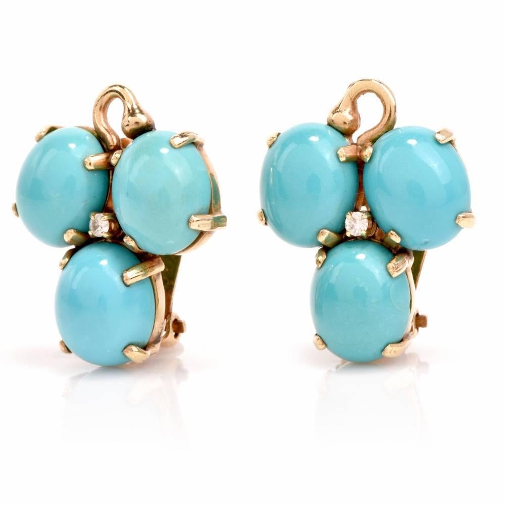 These Vintage earrings with Persian turquoise cabochons gems and diamonds are crafted in solid 14-karat yellow gold The expose a matched 6 oval Persian Turquoise cabochons secured by elongated prongs approx 22.00 carats. The azure gemstones are