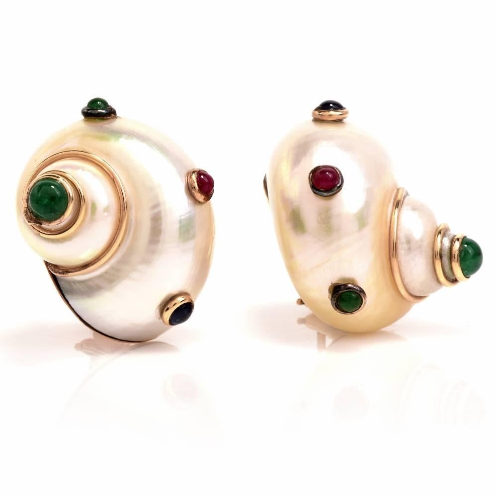 14k gold earrings by MAZ, featuring shell top, decorated with Emeralds, Rubies and  Sapphires, These estate earrings of vivacious aesthetic comprise a pair of immaculately carved mother-of-pearl snail motif profiles mounted on 14-karat yellow gold