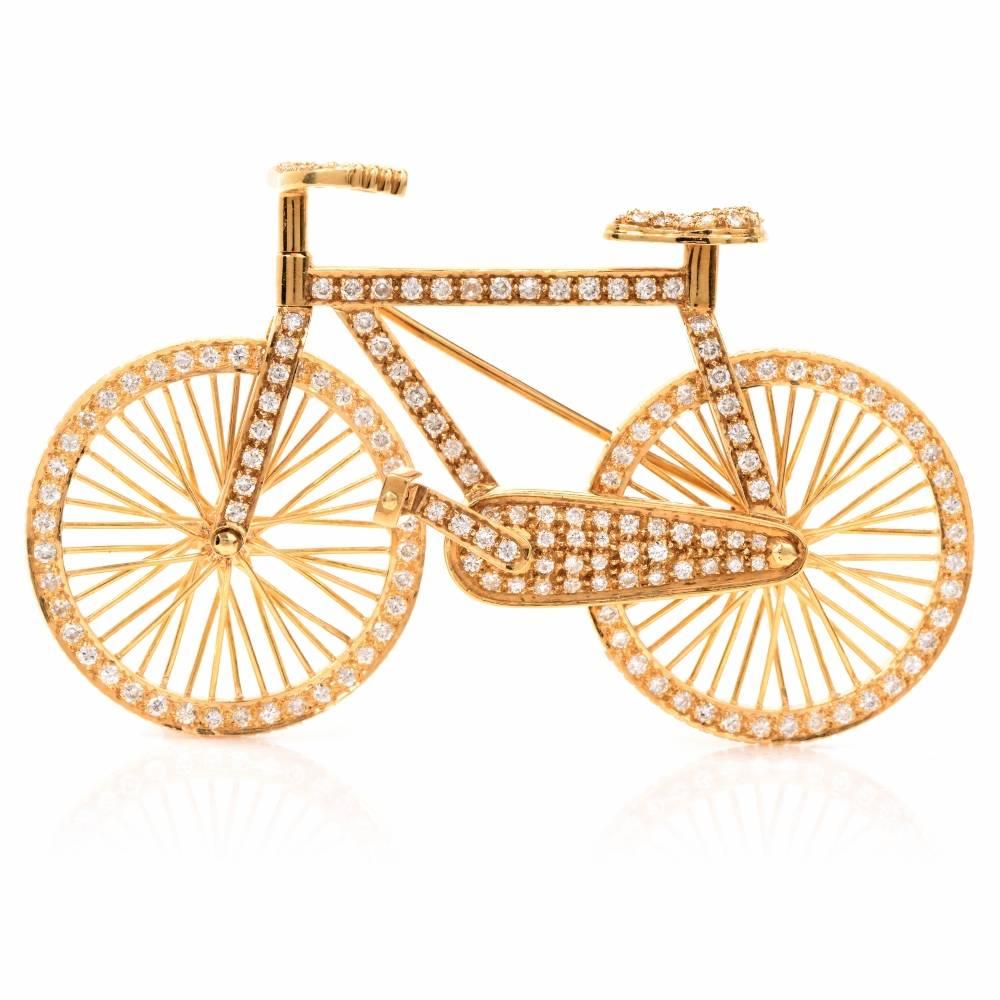 This adorable Estate bicycle figurine pin brooch is handcrafted in solid 18K yellow gold. Displaying a lovely and delicately designed bicycle motif, this brooch is embellished with 183 genuine round cut Diamonds approx: 2.75cttw, H-I color, VS