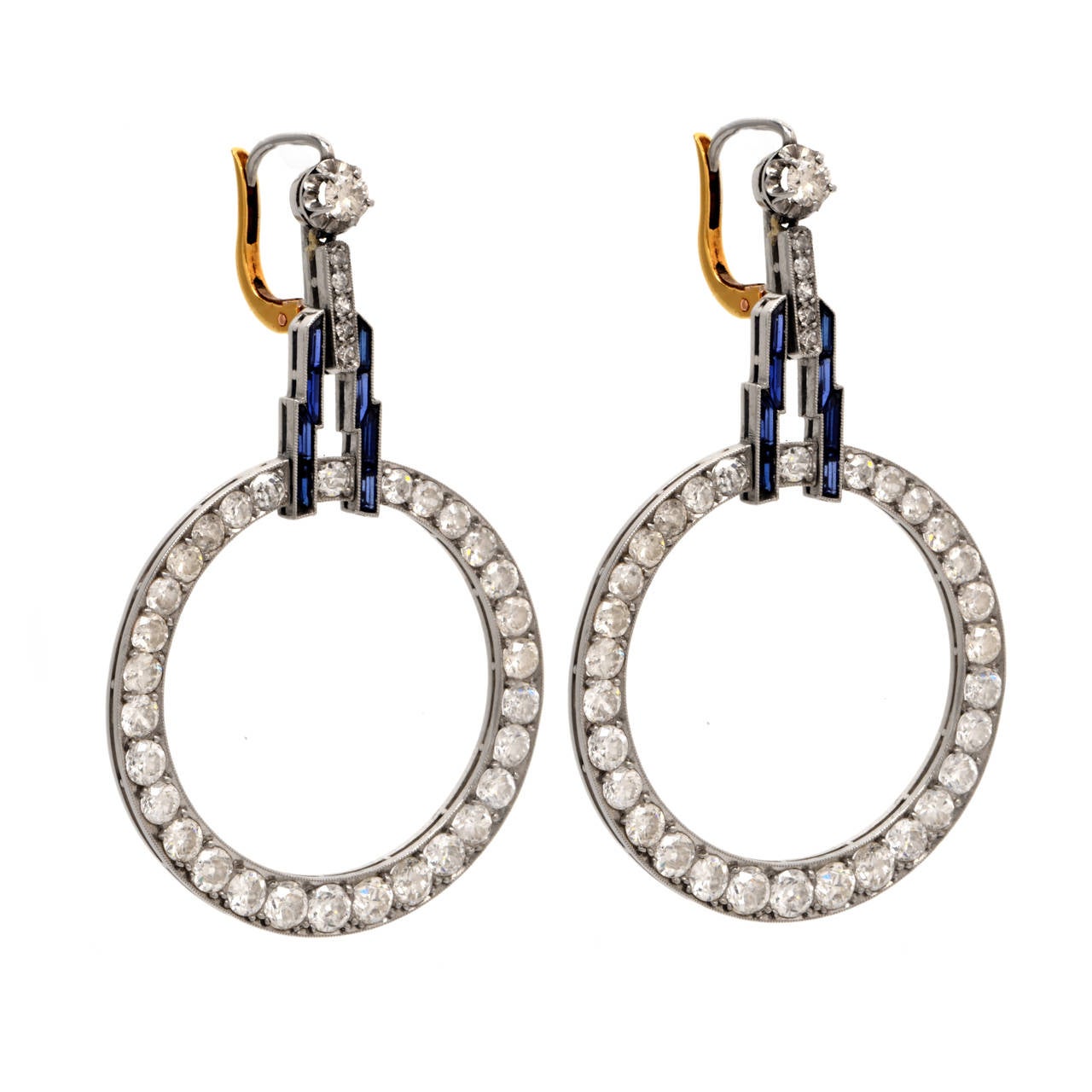 These fabulous and  rare antique Art Deco  earrings of  impeccable design and workmanship are crafted in  solid platinum with  yellow gold  lever-backs, weighing 12.8 grams and measuring 2