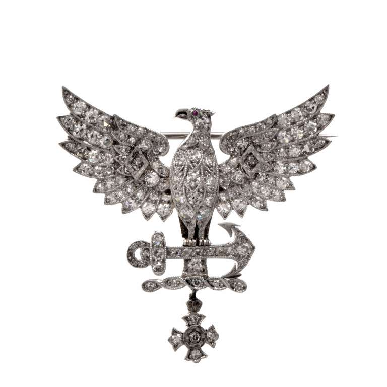 This antique Art Nouveau brooch of European provenance is crafted in solid platinum, weighing app. 10.8 grams and measuring 35mm x 33mm. This exquisite brooch of un matched finesse and monochromatic aesthetic beauty depicts the anatomically accurate