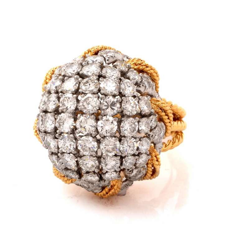 This conspicuous 1960's vintage cocktail ring designed by David Webb is crafted in solid 18K yellow gold with a platinum top, weighs approx. 26.9 grams and is 20mm high.  Designed as an attention-seeking dome plaque, this luxurious cocktail ring is