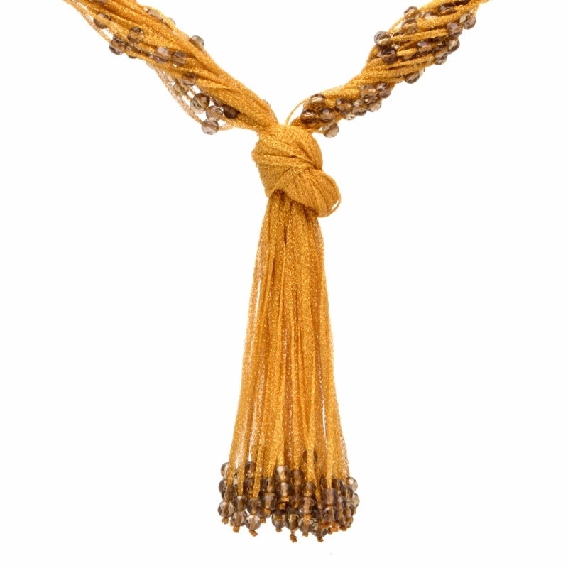 This stunning Italian 18K yellow gold drop pendant necklace by designer 'Calgaro' features various mesh strands made in solid 18 gold that are adorned with 380 genuine round smokey topaz gem sliding beads, approx: cttw. This beautiful drop pendant