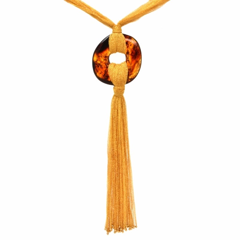 This Italian 18K yellow gold exotic drop pendant necklace by designer 'Calgaro' features various solid 18k mesh intertwined strands that are centered with a lovely openwork circular natural amber stone connected with the mesh strands. The drop