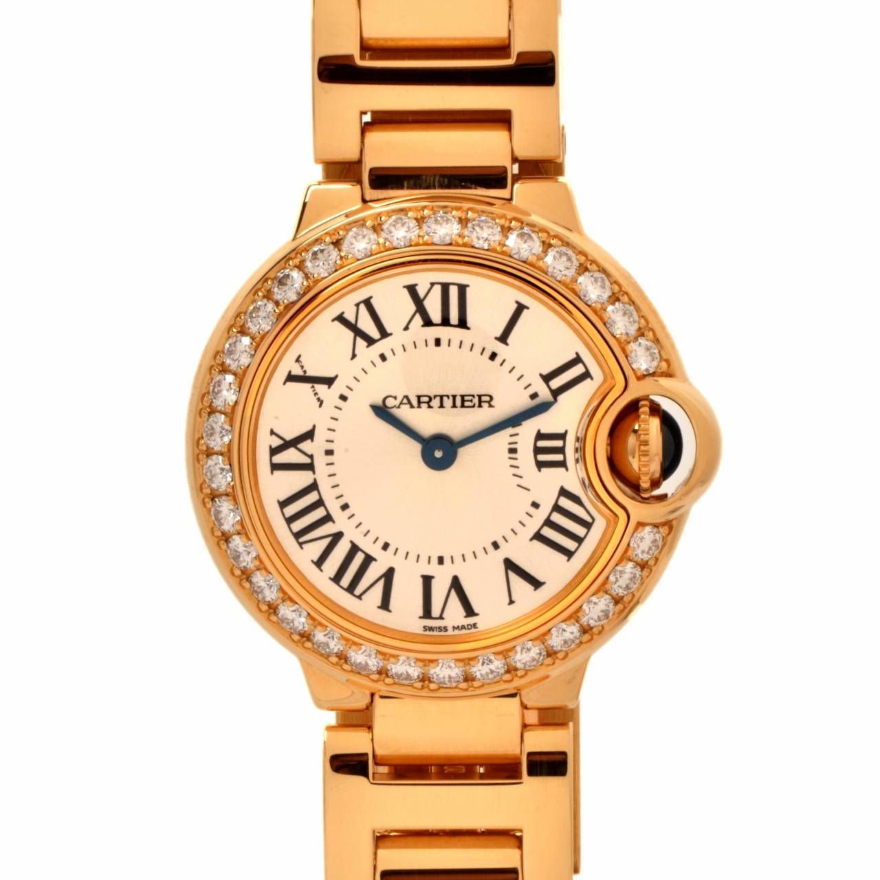 This lady's Ballon Bleu watch by Cartier adds a dash of elegance to any wrist. Roman numerals are guided on their path by a sapphire cabochon winding mechanism guarded by an arc of precious metal. The convex curves of the case, guilloche dial,