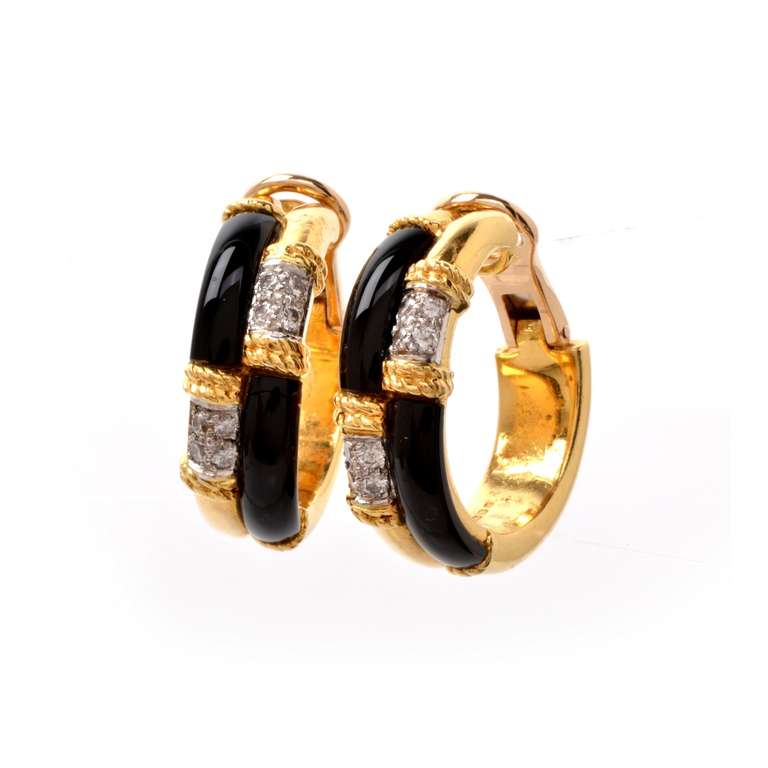 These alluring estate hoop earrings of  elegant aesthetic are of British provenance, bearing the official hallmark and the Assay Mark of London. They are crafted in  solid 18K yellow and rose gold, weigh approx. 45 grams and measure approx. 1.25