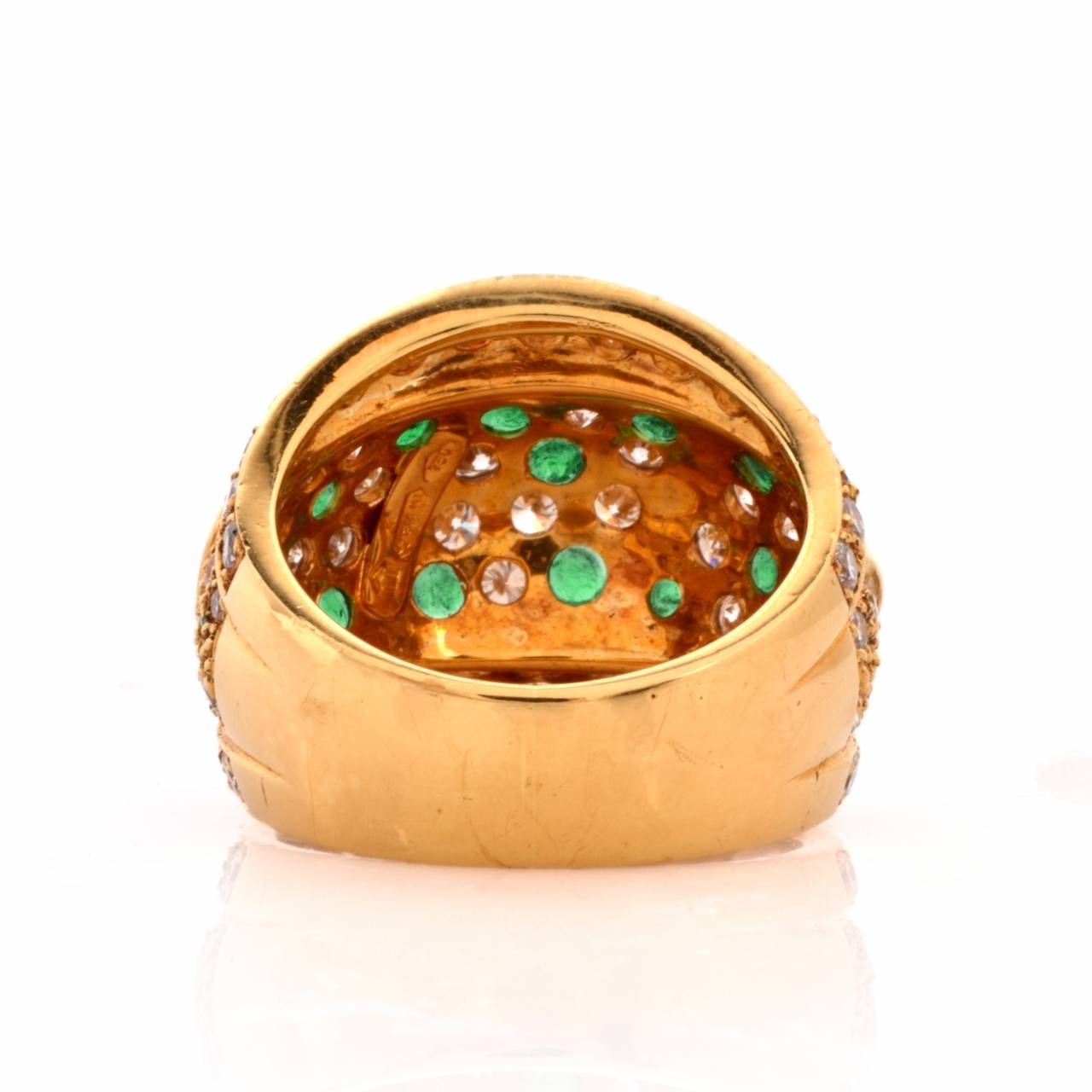 This captivating estate Retro cocktail ring  is crafted in elegantly matted and polished 18K yellow gold,  weighing approximately 13.2  grams and measuring 20 mm wide.   In classically distinct and  stylish design,  this alluring  ring incorporates