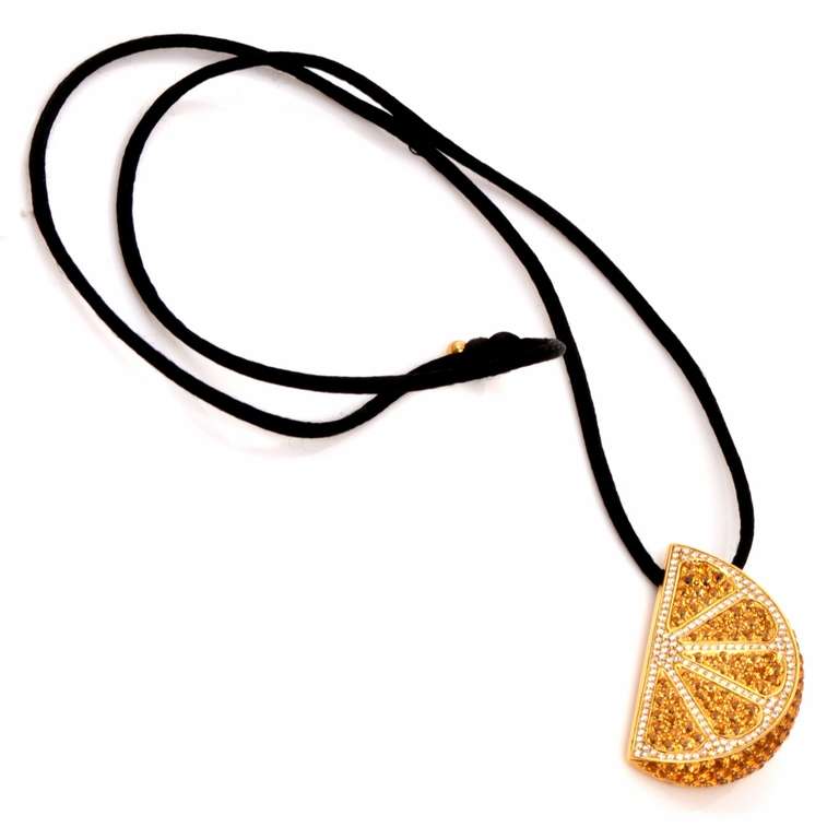 coach orange slice necklace