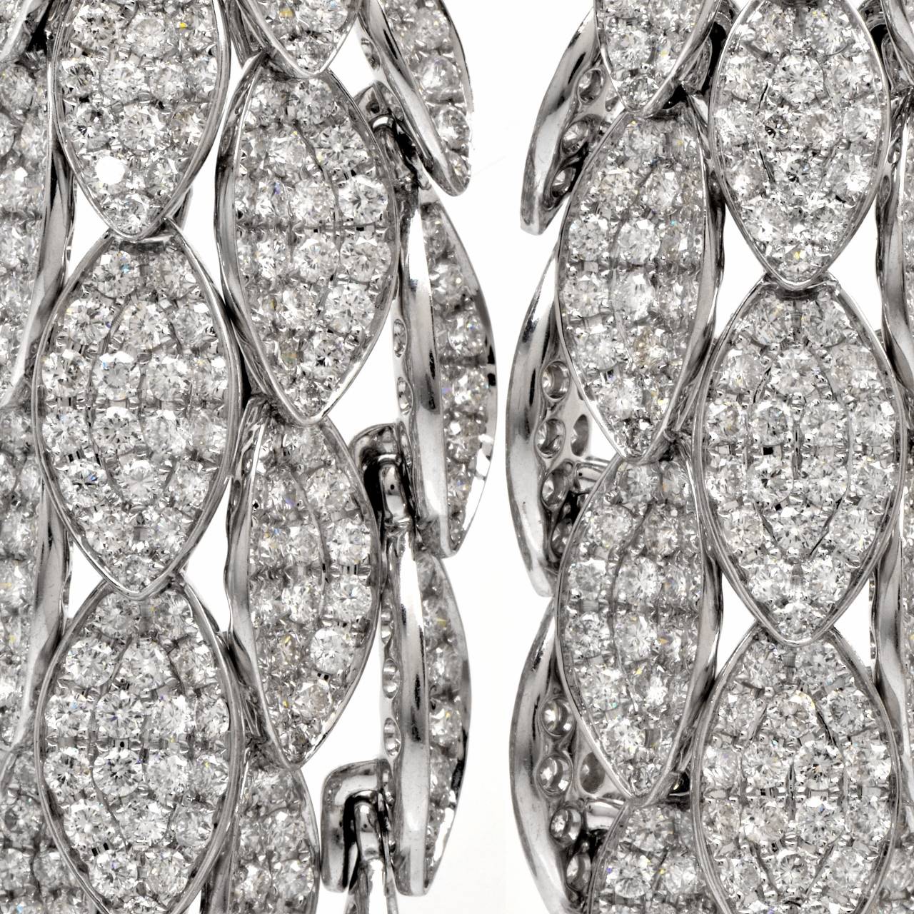 These gorgeous chandelier earrings of sophisticated  and refined  aesthetic are crafted in solid 18K white gold, weighing 43.00 grams and measuring 3
