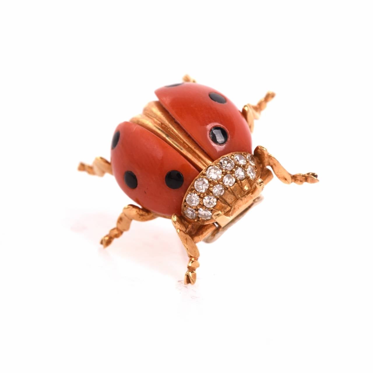 This enchantingly beautiful Tiffany & Co. lapel brooch from the vintage era is designed as a delicate and anatomically accurate sculptured silhouette of a lady beetle (also referred to as lady bug). Crafted in solid 18K yellow gold, this delicate