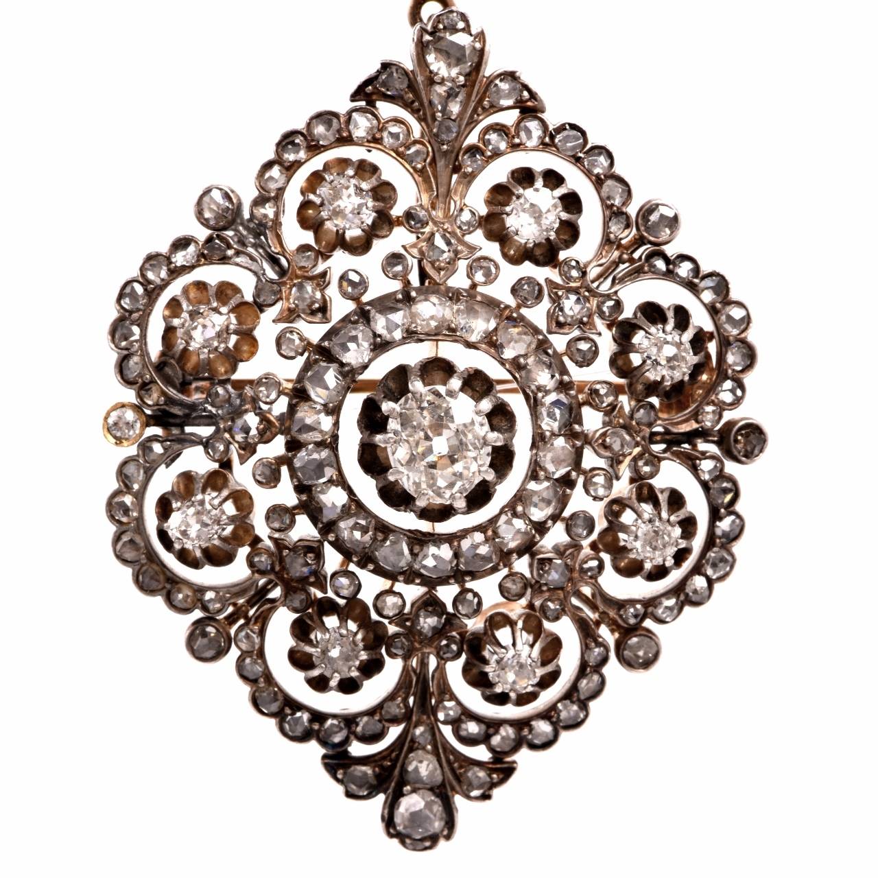 This fascinating antique pendant and brooch from the Georgian era is crafted in silver-topped yellow gold, weighing 24.3 grams and measuring 2.6