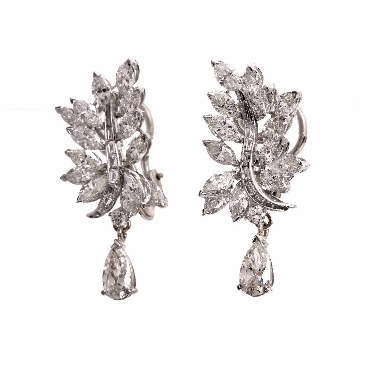 These  estate  earrings of extravagant aesthetic and outstanding elegance are crafted in platinum  weighing approx. 15.7 grams and measuring  1.5 
