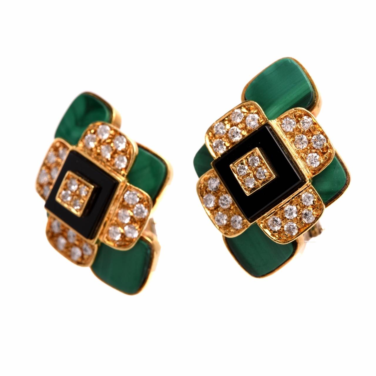 These impressive vividly colored estate earrings of opulent size are inspired by the popular style of earrings during the  1980s  era. Crafted in solid 18K yellow gold, they incorporate a pair of stylized lozenge profiles, centered with diamond,