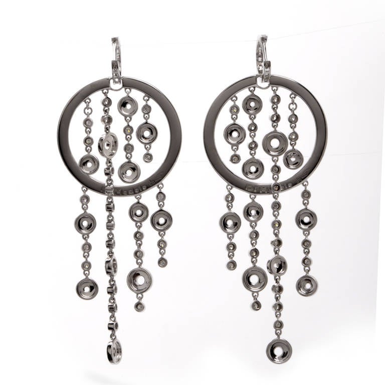 These Designer Di Modolo chandelier  diamond earrings with Iberian-inspired cascading pendants are crafted in solid 18K white gold, weigh approx. 26.5 grams.  These estate earrings  of impressive  design incorporate each 7 cascading 'fringe