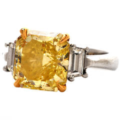 Fancy Intense Yellow Diamond Gold Platinum Engagement Ring