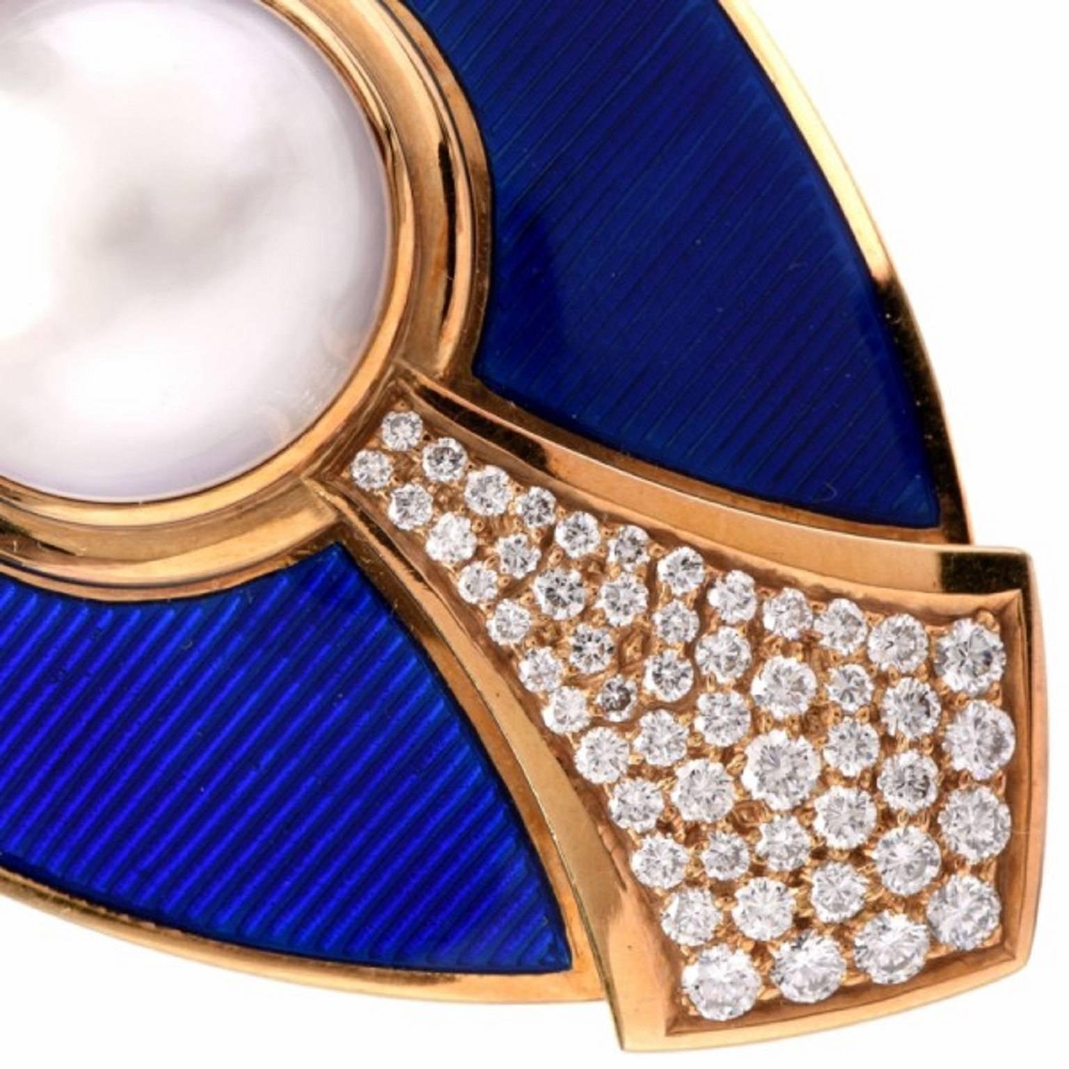 This enamel brooch with a South Sea half-pearl and pave diamonds is of English provenance, bearing the official Assay Mark of London . the goldsmith's initials L.D.V and the purity mark '750' on the side dimension. It is crafted in solid 18K yellow