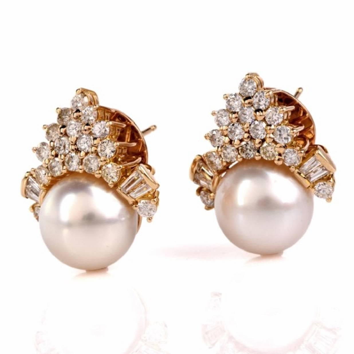 These enchantingly elegant and highly sparkling  estate earrings of sophisticated aesthetic are crafted in solid 18K yellow gold, weigh 19.1 grams and measure 23 x 21 mm. These alluring earrings  incorporate a pair of   lustrous South Sea pearls of