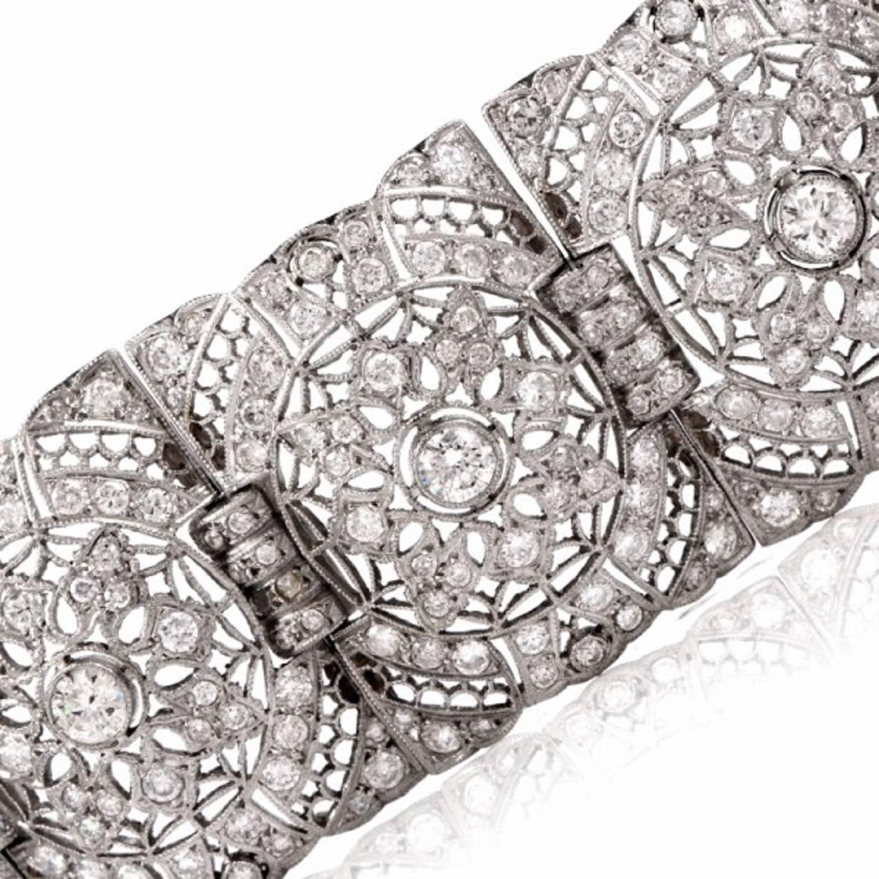This  sparkling antique diamond bracelet with immaculate filigree enhancements throughout is crafted in solid platinum, weighing 71.7 grams and measuring 7. 1/4