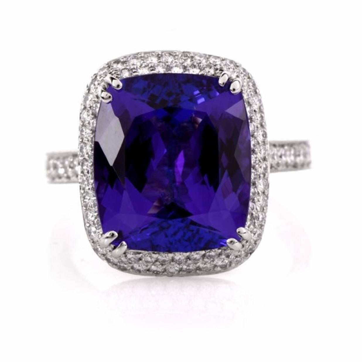 This elegant enchanting Designer Beaudry engagment ring with diamonds and blue tanzanite is crafted in solid platinum, weighing approx: 9.4 grams. Ring  measuring approx: 16mm x 13.5mm. Designed as a stylized square plaque with delicately detailed