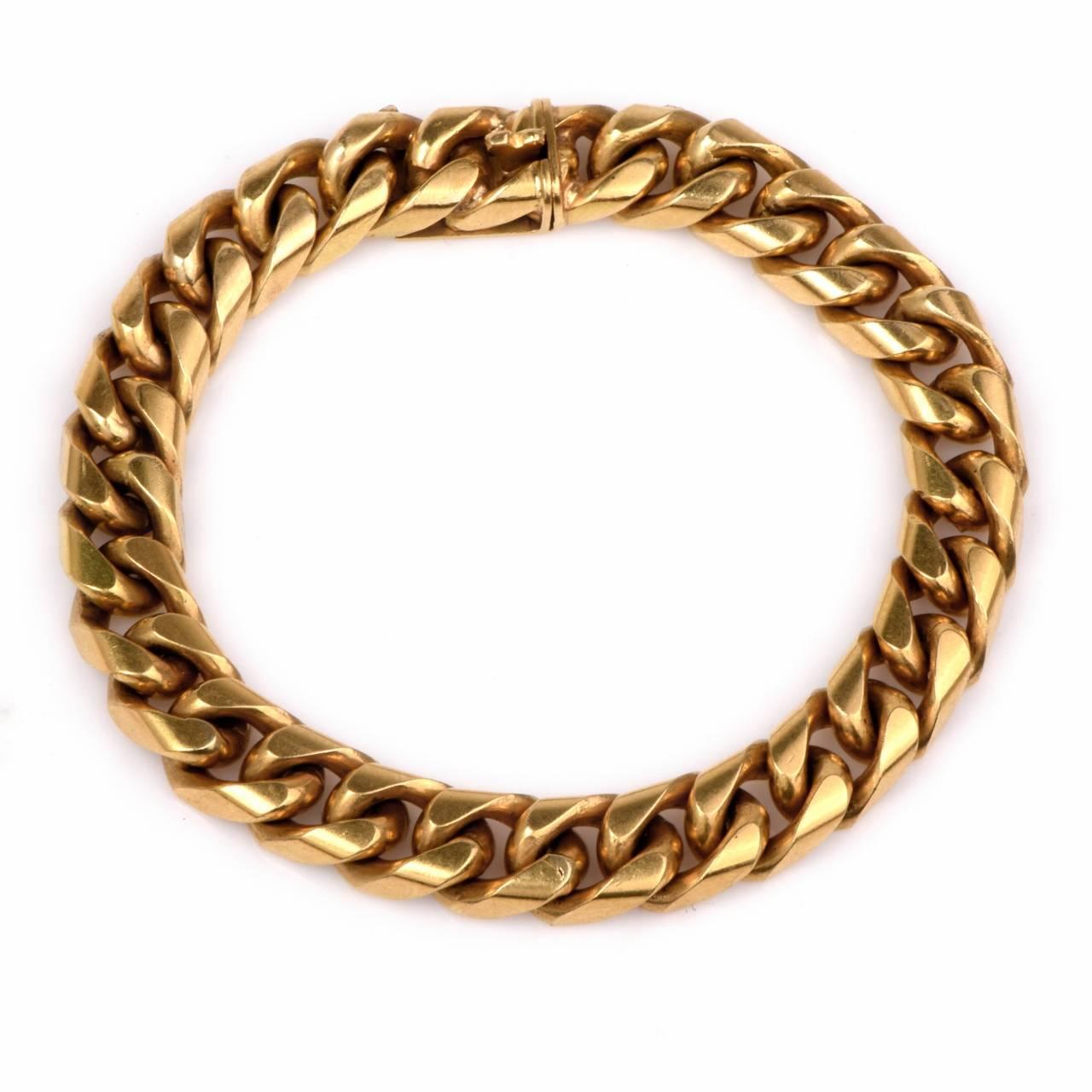 This bold  heavy Cuban link bracelet with classically is crafted in solid 18K yellow gold, weighing approx: 73.2 grams and measuring approx: 7.5