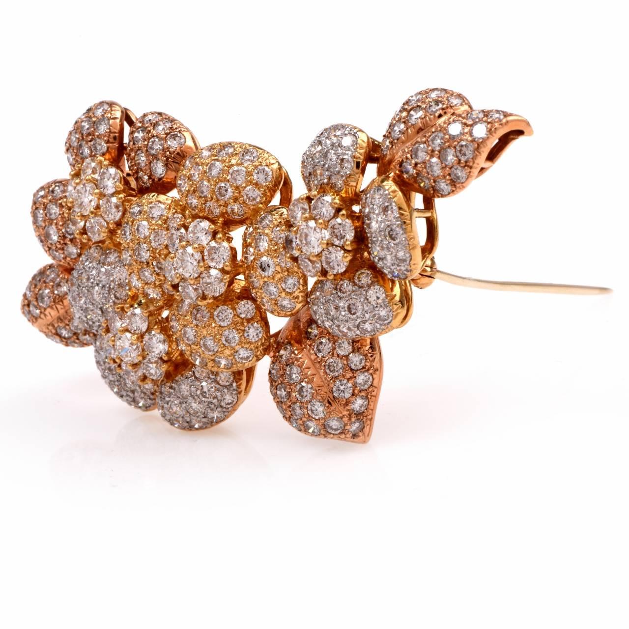 This alluringly estate diamond lapel brooch of unique aesthetics and flexibility is crafted in solid 18K yellow gold, weighing approx: 26.5 grams and measuring approx: 60mm in diameter.  The highly sparkling lapel brooch is completely embellished