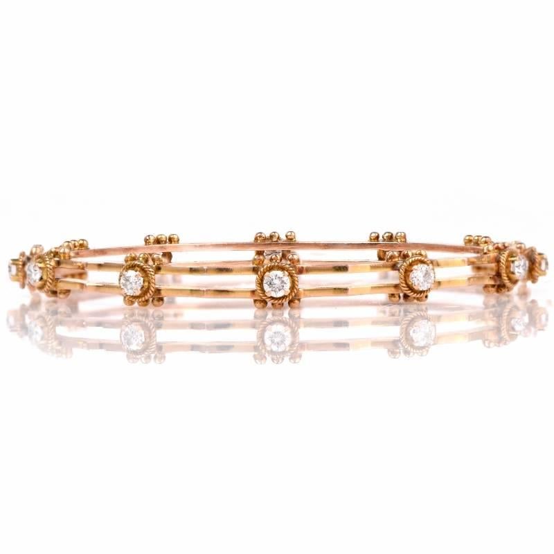 This delicately detailed vintage retro diamond stackable bangle bracelet is crafted in solid 18K yellow gold, weighing approx: 17.0 grams and measuring approx: 6mm max width and measuring approx: 7 