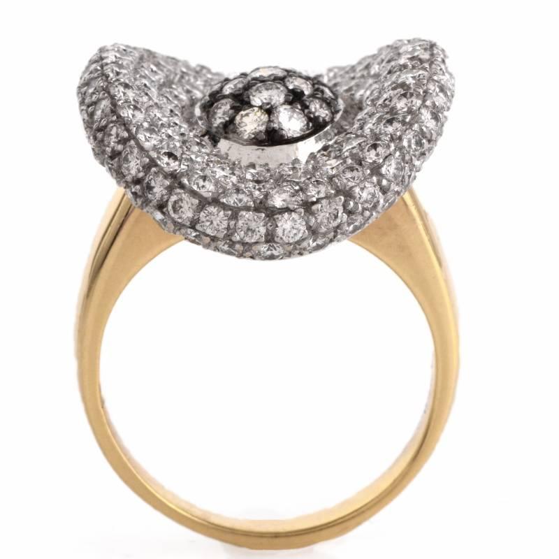 This estate cluster diamond cocktail ring is crafted in solid 18K white gold with yellow gold for the band, weighing approx: 13.1 grams and measuring approx: 20mm x 19.5mm.  This ring is embellished completely with a multitude of 170 genuine round