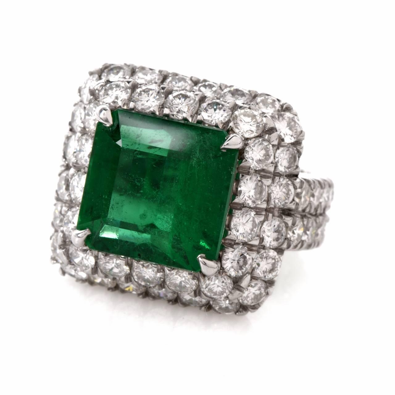This beautiful estate engagement ring is crafted in solid platinum. The center exposes a gorgeous extremely high quality genuine vibrant green square emerald cut emerald of approx. 8.32ct, prong set (11.22mm x 11.77 x 8.7mm). Surrounded by 83 round