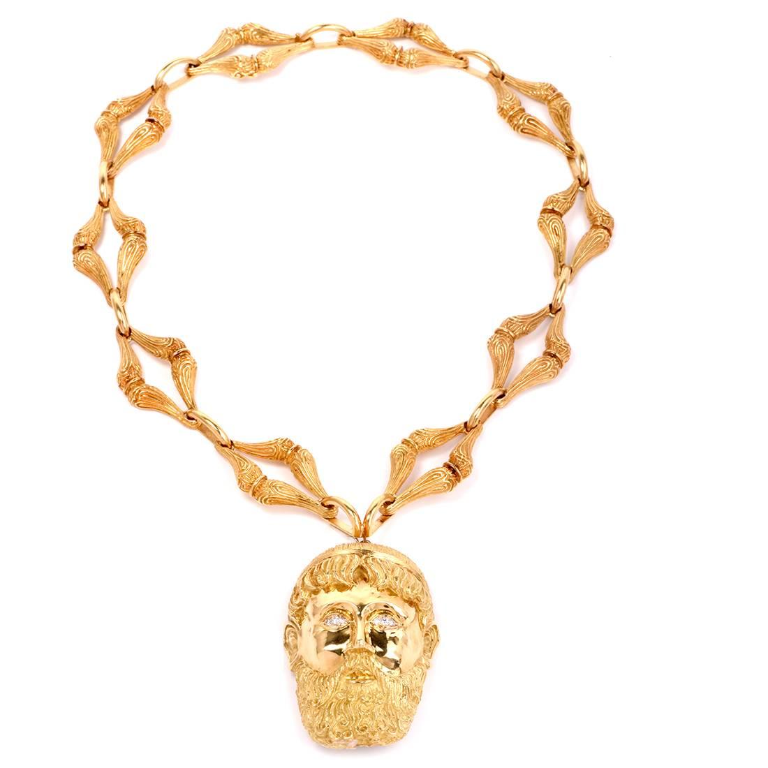 This one of a kind Henry Dunay captivating long necklace/pendant and bracelet of Greek inspiration crafted in solid 18K yellow gold.
The necklace incorporates a detachable head pendant rendered in polished gold and enriched with 6 genuine