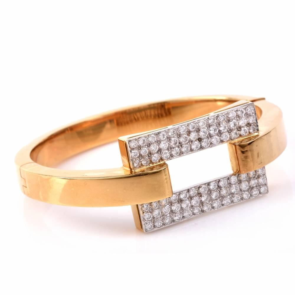 This fabulous bangle bracelet in solid 18K yellow gold. Topped with an openwork square deco design, is covered with some 78 genuine round cut dazzling diamonds approx: 3.77cttw, G-H color, VS1-VS2 clarity, prong set. With a security insert clasp,