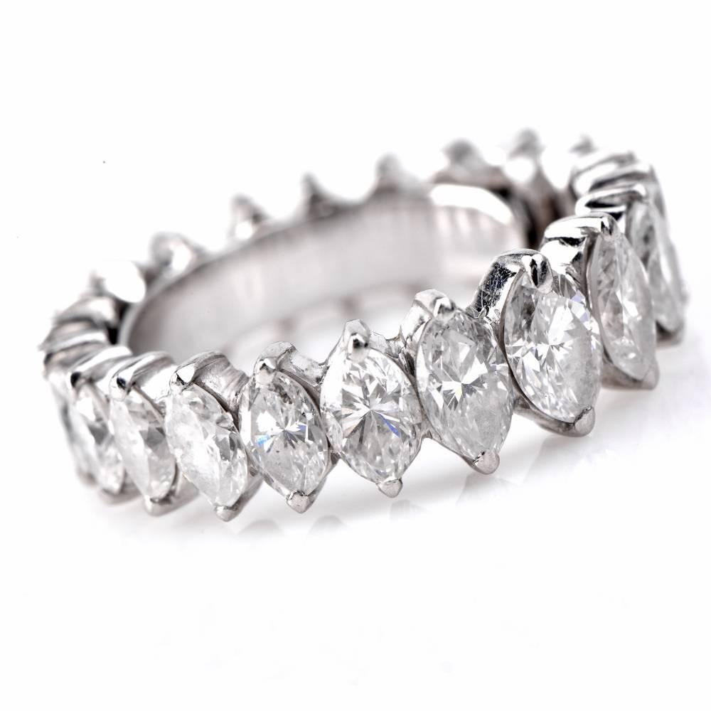 This dazzling eternity band design is crafted in solid platinum. Featuring a full circle of 22 genuine marquise cut diamonds approx: 3.74cttw, H-I color, VS1-VS2 clarity, prong set. This ring is in very good condition!!

Weight is approx: 6.3