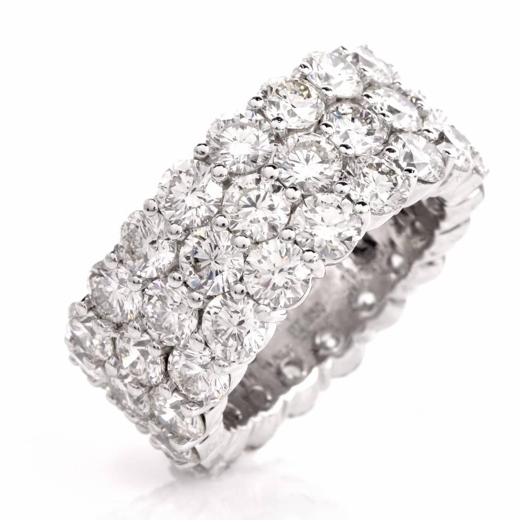 This breathtaking platinum 3 row wide eternity band ring is adorned with 60 genuine round-faceted diamonds weighing cumulatively 10.53 cts, graded I color and VS1-VS2 clarity. This exceptional wide eternity band remains in excellent