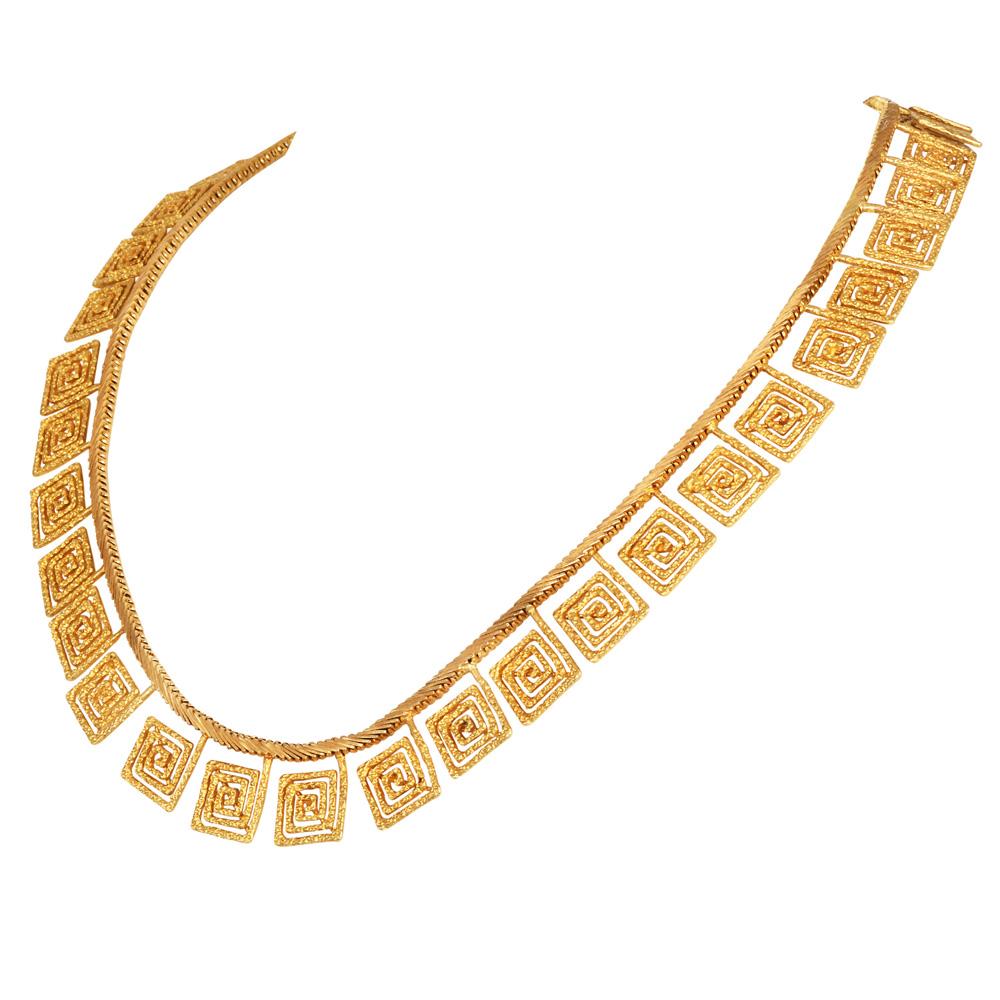 Collier à motif de clé grecque en or jaune 18 carats texturé d'Ilias Lalaounis

Expression audacieuse de l'héritage hellénique, ce collier à motif de clé grecque vintage du célèbre designer Ilias Lalaounis est réalisé en or jaune 18 carats richement