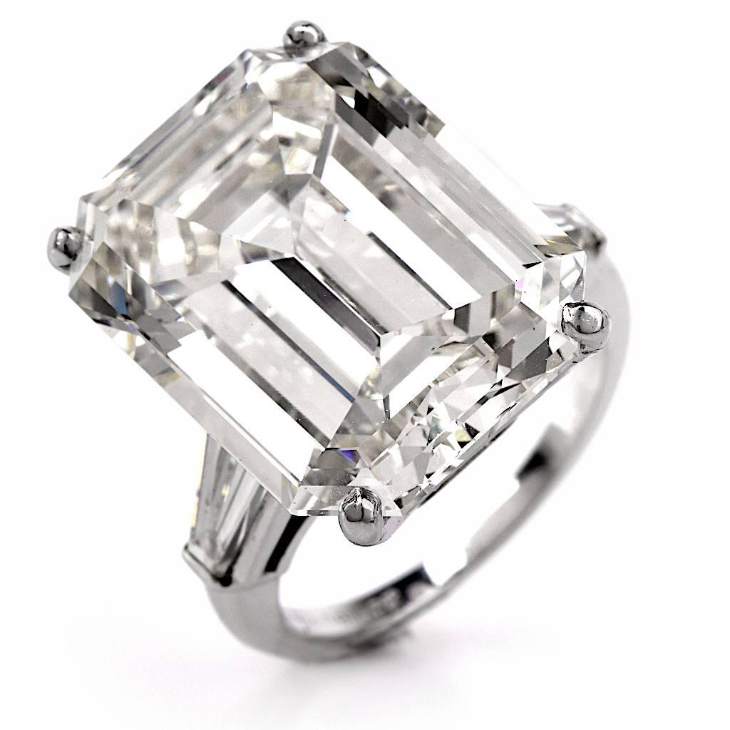 This conspicuous impressive engagement ring with an outstanding 18.61ct emerald-cut diamond is crafted in solid platinum. Designed with simplicity yet of sophisticated elegance and unsurpassed aesthetic appeal, this unique diamond engagement ring