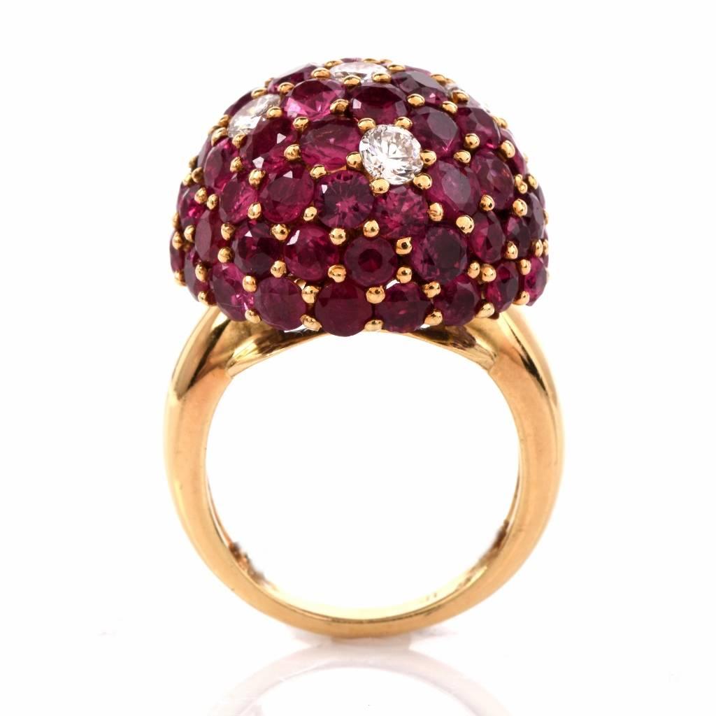 This vivacious Estate  cocktail ring of  impressive aesthetic  and immaculate workmanship is crafted in solid 18K yellow gold and weighs approx. 16.5 grams. Designed as an opulent semi-spherical bombé plaque, this  fabulous ring is resplendent in 