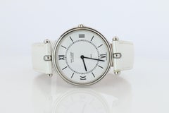 Van Cleef and Arpels 53 104 watch. La Collection 18k SS Round 32mm Watch