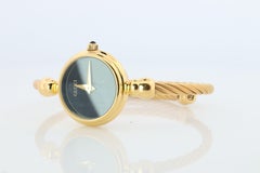 Reloj vintage GUCCI 2700.2.L de cuarzo. Reloj de pulsera Gucci Ladies Bangle Gold Tone