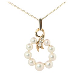 Ciondolo Mikimoto. Collana vintage Mikimoto in oro giallo 14k con perle e diamanti a forma di ghirlanda