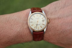 Genuine Rolex 1505 Watch. Rolex Oyster Perpetual Date 34mm Engine Turned Bezel