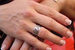 Mikimoto Wide Band. Platinum Mikimoto Intricate Floral Negative Stamped ring.