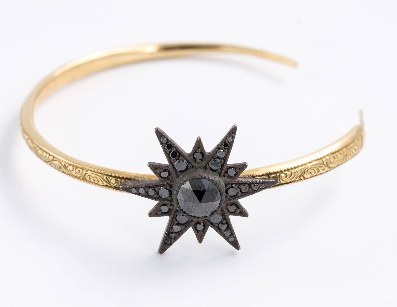 Stunning black diamonds set in statement making loops. A black diamond star motif makes them extra special to wear. Elephant backs secure them. Artist made, signed Arman Sarkisyan. Weigh 21.60 grams.